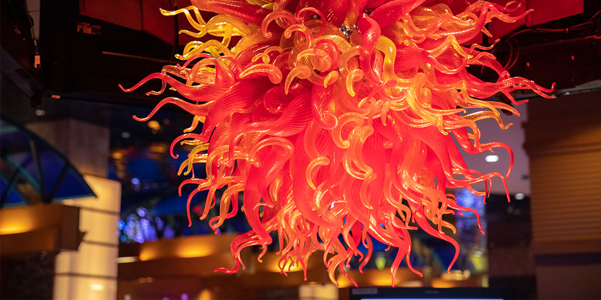 Glass orange Decoration on ceiling at The River Bar